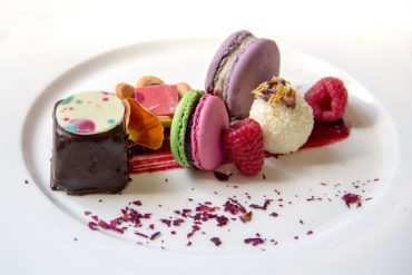 Moelleux with dark chocolate, macaron and chocolate sphere.