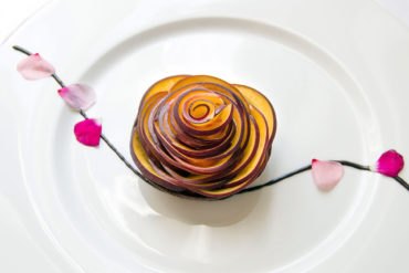 Chocolate tartlet with creamy almonds and vanilla peaches.