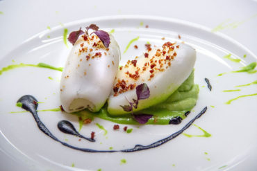 Steamed cuttlefish, peas pannacotta and ham powder.