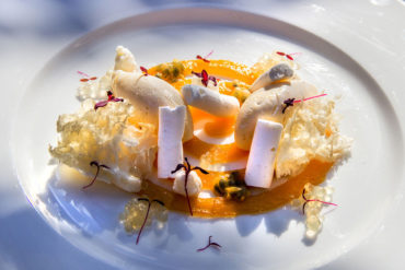 White chocolate mousse and passion fruit with creamy almonds and honey caviar.